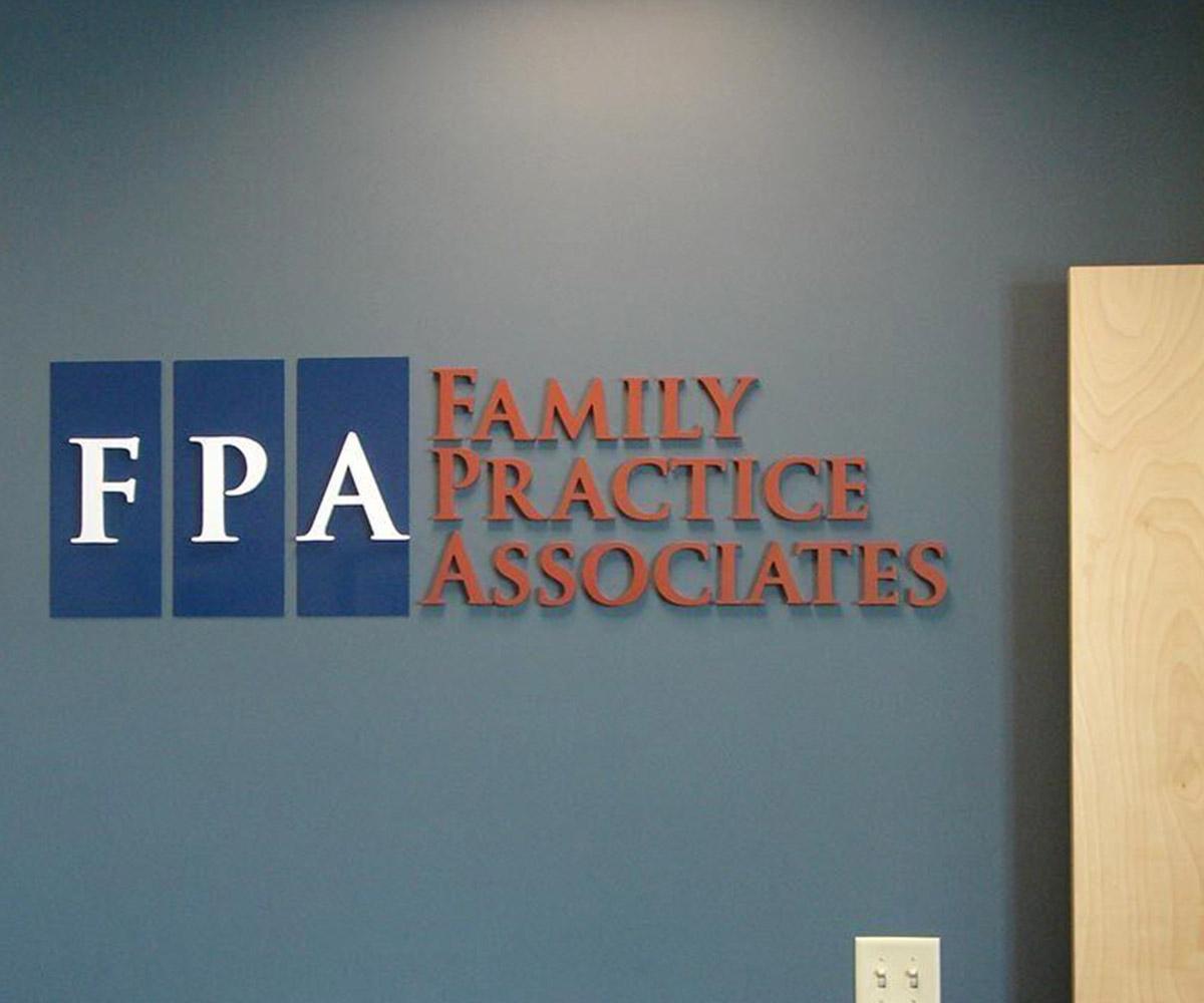 wall with logo of business and other Custom Wall Graphics