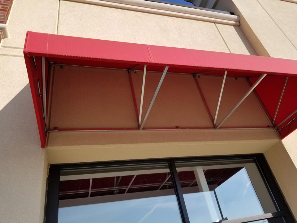 Red Commercial Awning on Building in Youngstown, OH