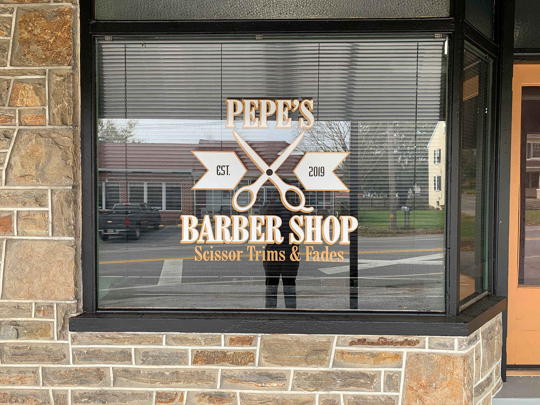 storefront window after Sign Installation from Sign Company in Aston, Pennsylvania