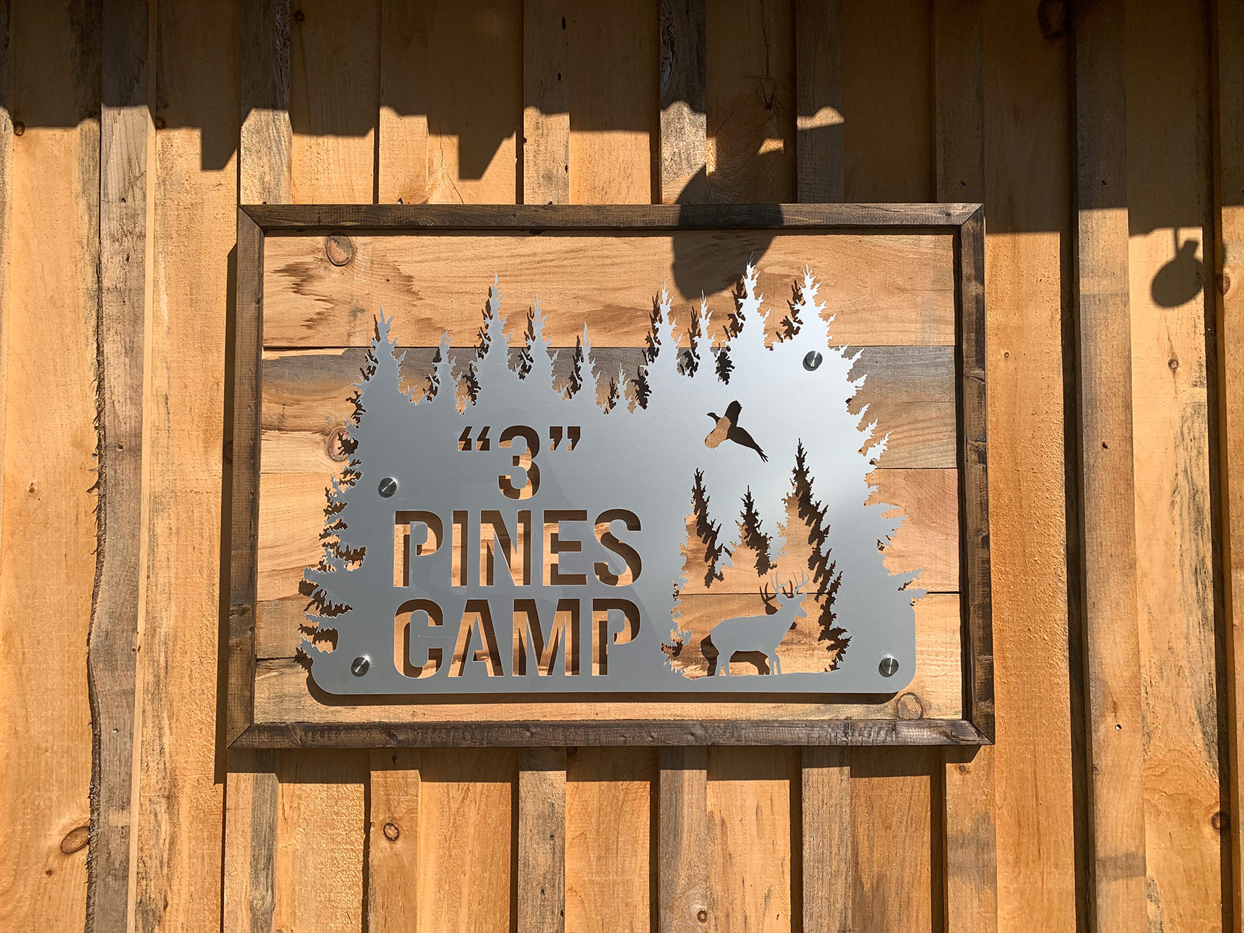 steel sign on wood background and other Custom Signs and Sign Installation in Aston, PA