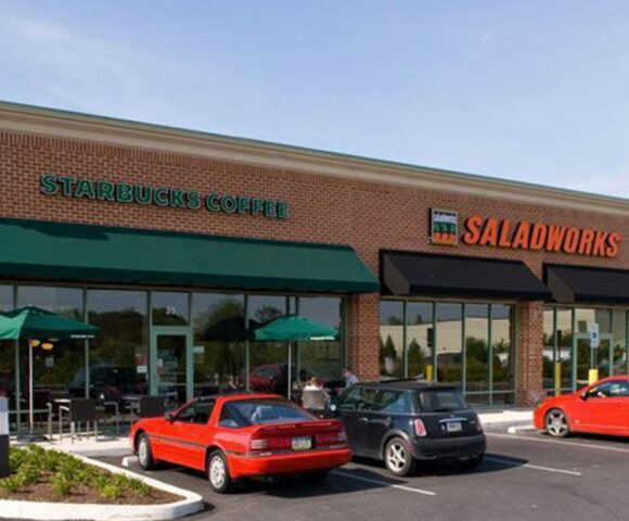 a brick building for Starbucks Coffee, Saladworks, and other Business Signs, Commercial Awnings, and Truck Wraps in Pulaski, PA