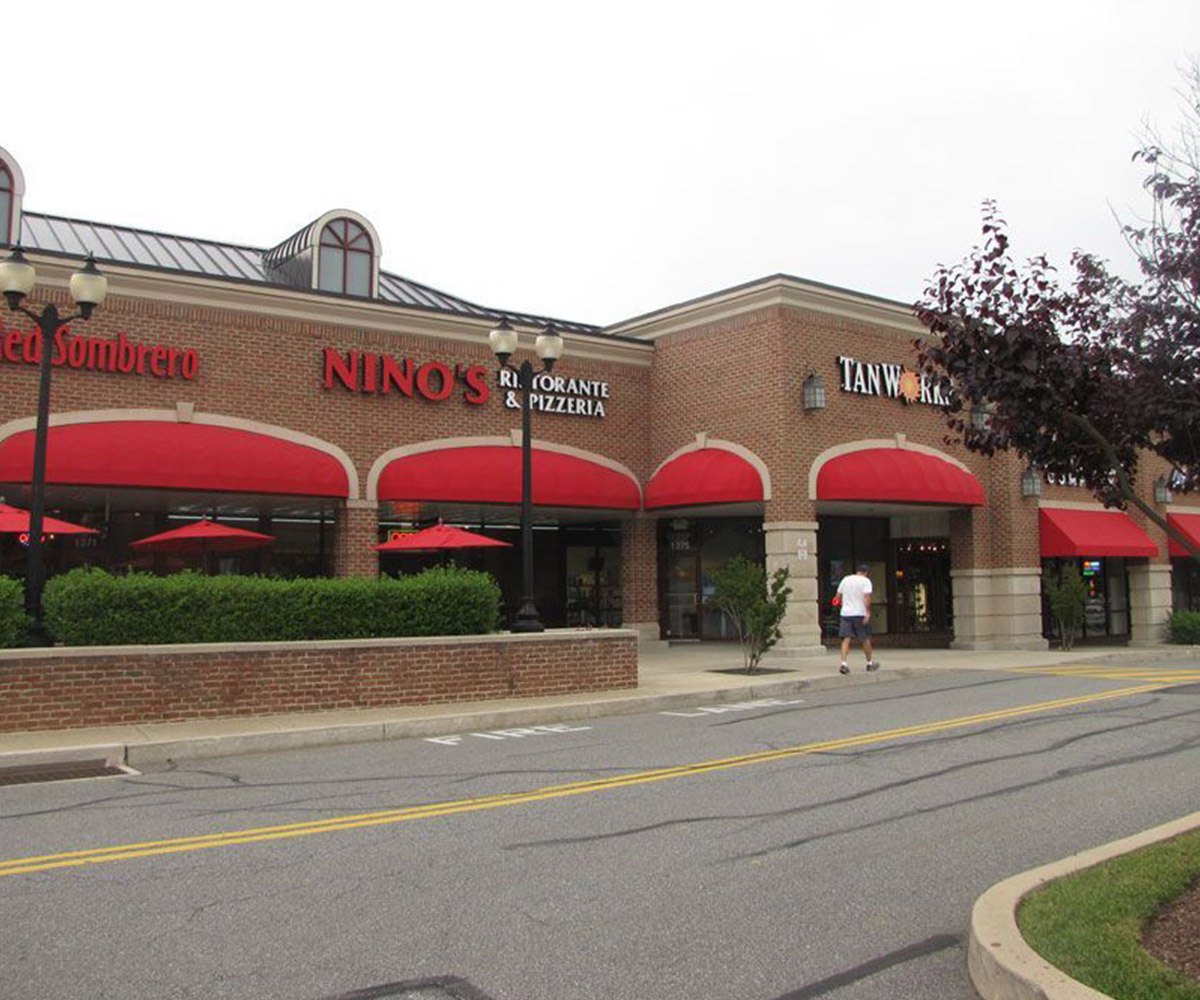 Red Commercial Awnings in Shopping Center in Warren, OH