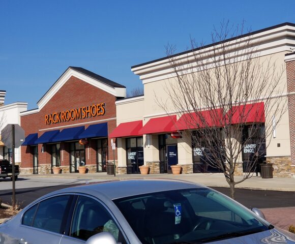 a parking lot for businesses featuring different types of Business Awning in Edinburg, PA, Mt. Jackson, PA, Oakwood, PA, Pulaski, PA, West Middlesex, PA, Toughkenamon, PA